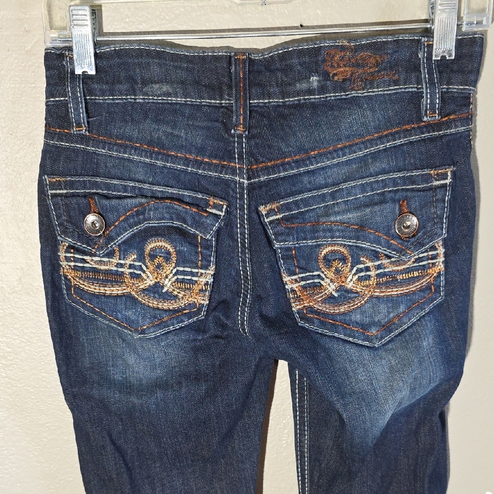Elegant Boot Cut Jeans with Embroidered Pockets